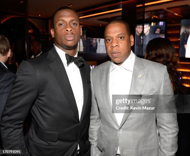 Geno Smith and Jay-Z attend The 40/40 Club 10 Year Anniversary Party at 40 / 40 Club on June 17, 2013 in New York City.