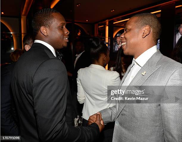 Geno Smith and Jay-Z attend The 40/40 Club 10 Year Anniversary Party at 40 / 40 Club on June 17, 2013 in New York City.