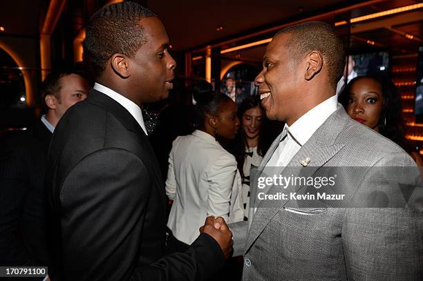 Geno Smith and Jay-Z attend The 40/40 Club 10 Year Anniversary Party at 40 / 40 Club on June 17, 2013 in New York City.