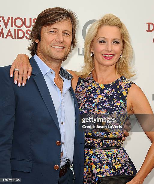 Actor Grant Show and actress Katherine LaNasa attend the premiere of "Devious Maids" at Bel-Air Bay Club on June 17, 2013 in Beverly Hills,...