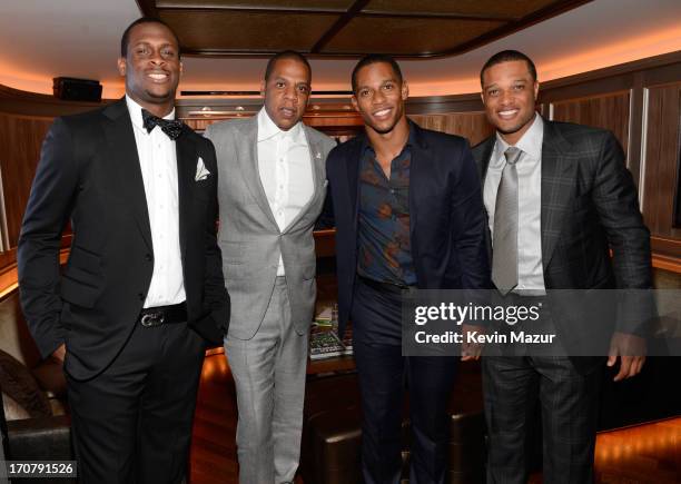 Geno Smith, Jay-Z, Victor Cruz and Robinson Cano attend The 40/40 Club 10 Year Anniversary Party at 40 / 40 Club on June 17, 2013 in New York City.