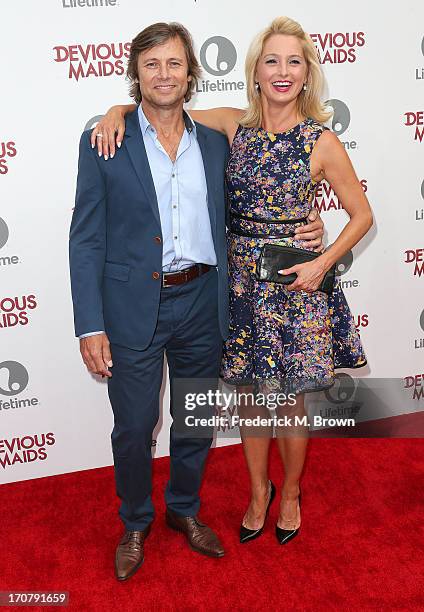 Actor Grant Show and his guest attend the premiere party of Lifetime Original Series "Devious Maids" at the Bel-Air Bay Club on June 17, 2013 in...