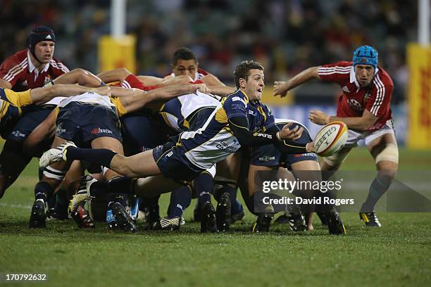 Ian Prior of the B Brumbies passes the ball during the International tour match between the ACT Brumbies and the British & Irish Lions at Canberra...