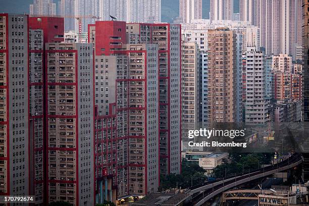 Residential buildings stand in the Ngau Tau Kok area of Hong Kong, China, on Wednesday, June 12, 2013. A shortage of housing, low mortgage costs and...