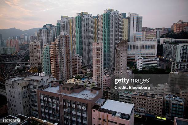 Residential and industrial buildings stand in the Kowloon East area of Hong Kong, China, on Wednesday, June 12, 2013. A shortage of housing, low...