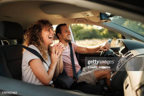 road trip romance - driving sun stock pictures, royalty-free photos & images