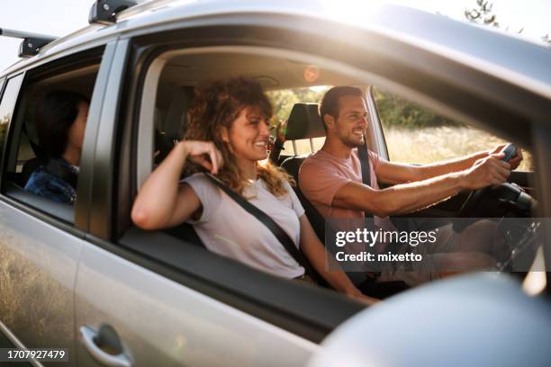 road trip romance - driving sun stock pictures, royalty-free photos & images