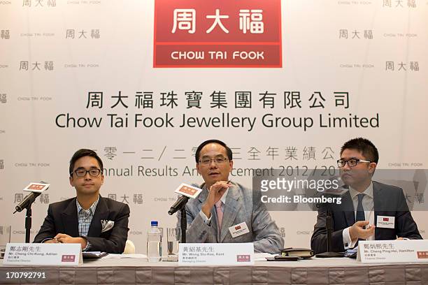 Adrian Cheng, executive director of Chow Tai Fook Jewellery Group Ltd., from left, Kent Wong, managing director, and Hamilton Cheng, finance...