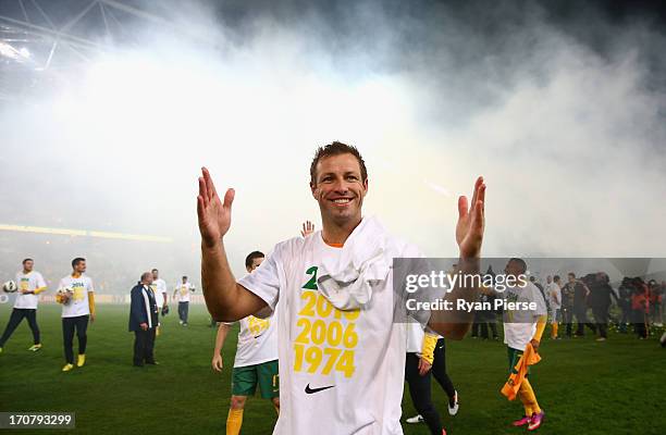 Lucas Neill of the Socceroos celebrates after the FIFA 2014 World Cup Asian Qualifier match between the Australian Socceroos and Iraq at ANZ Stadium...