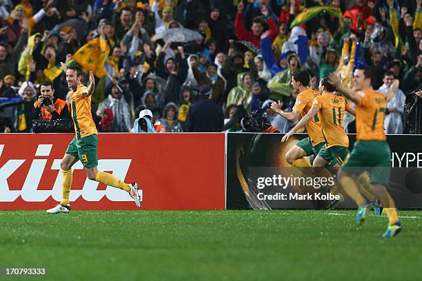 Josh Kennedy of the Socceroos celebrates scoring a goal during the FIFA 2014 World Cup Asian Qualifier match between the Australian Socceroos and...