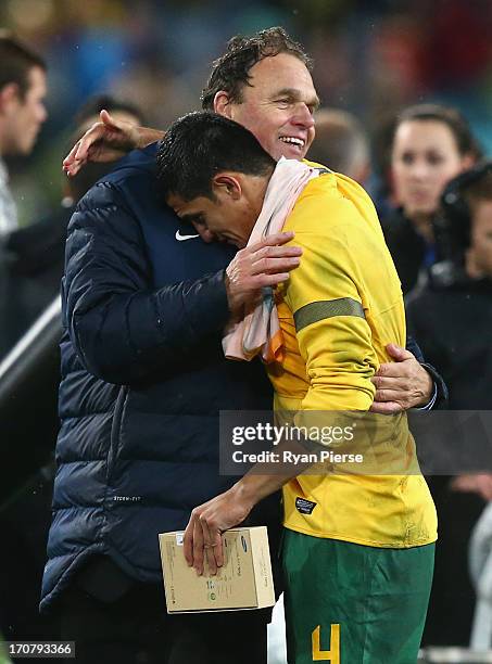 Holger Osieck, head coach of the Socceroos and Tim Cahill of the Socceroos celebrate after the FIFA 2014 World Cup Asian Qualifier match between the...