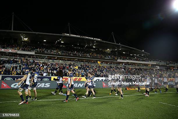 Brumbies players do a lap of honour after victory in the International tour match between the ACT Brumbies and the British & Irish Lions at Canberra...