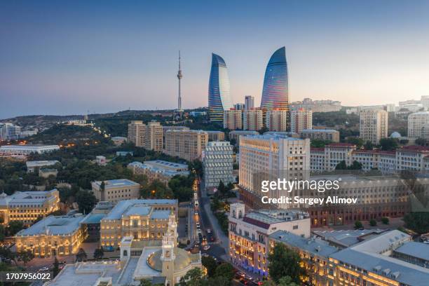 aerial – scenic sunset above the city of baku, azerbaijan - baku stock pictures, royalty-free photos & images