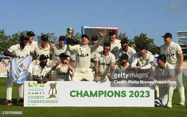 Rory Burns of Surrey lifts the County Championship trophy after the LV= Insurance County Championship Division 1 match between Hampshire and Surrey...