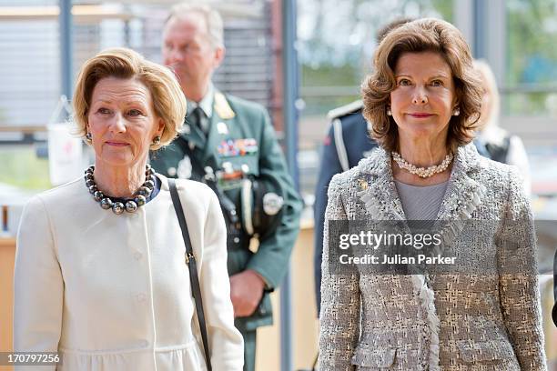 Queen Sonja of Norway and Queen Silvia of Sweden visit the offices of Statoil on June 18, 2013 in Harstad, Norway.