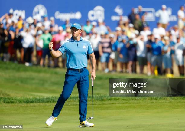 Rory McIlroy of Team Europe celebrates on the seventh green during the Friday afternoon fourball matches of the 2023 Ryder Cup at Marco Simone Golf...