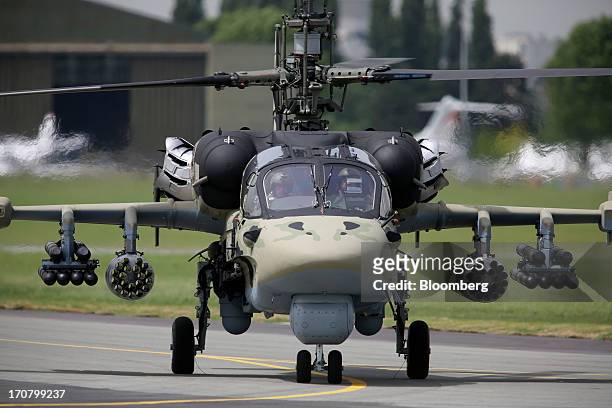 Military helicopter, manufactured by Kamov, a unit of OAO Russian Helicopters, taxis after landing on the second day of the Paris Air Show in Paris,...
