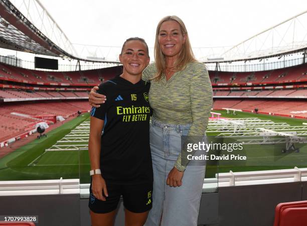 Katie McCabe is interviewed by former Arsenal Women's player Emma Byrne after signing a new deal with Arsenal at the Emirates Stadium on September...