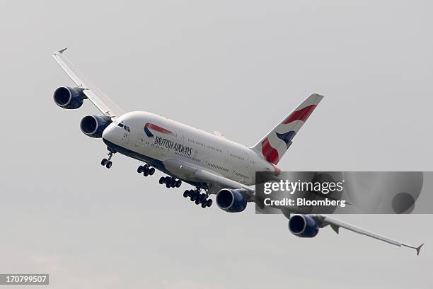 An Airbus SAS A380 aircraft operated by British Airways performs in a flying display on the second day of the Paris Air Show in Paris, France, on...