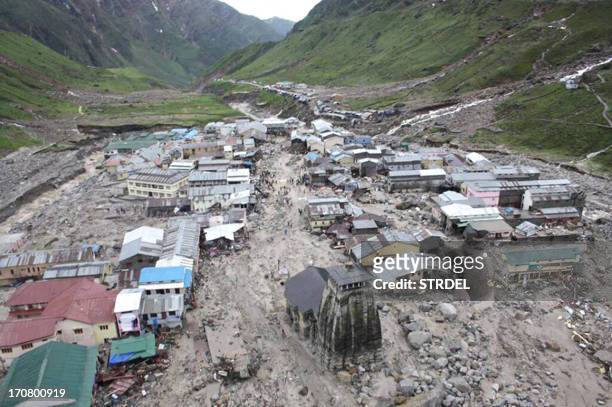 The Kedarnath Temple is pictured amid flood destruction in the holy Hindu town of Kedarnath, located in Rudraprayag district in the northern Indian...