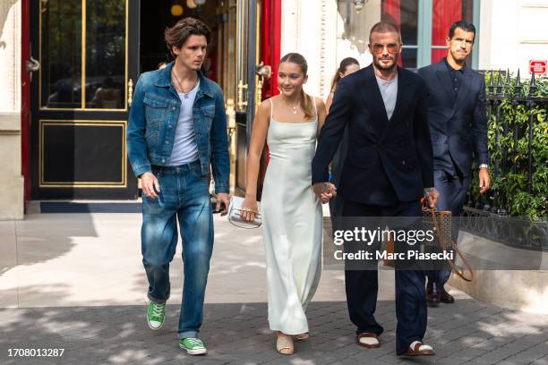 Cruz Beckham, Harper Beckham and David Beckham are seen on September 29, 2023 in Paris, France.