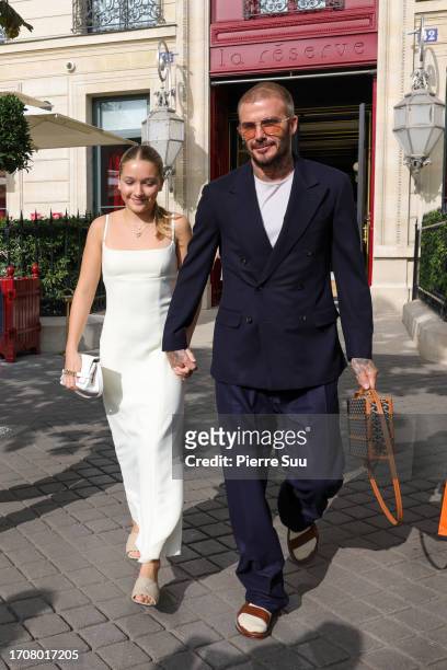 Harper Beckham and David Beckham are seen leaving their Hotel during the Womenswear Spring/Summer 2024 as part of Paris Fashion Week on September 29,...