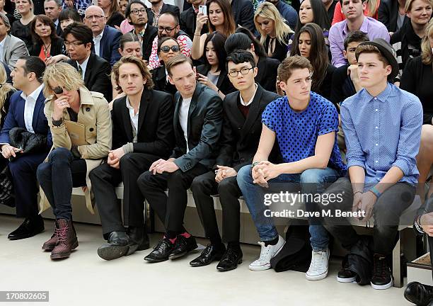 Mohammed Al Turki, Jamie Campbell Bower, Gabriel Burce, Dan Gillespie Sells, Khalil Fong, Finn Harries and Jack Harries sit in the front row at...