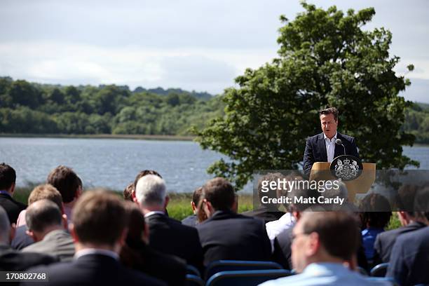 Britain's Prime Minister David Cameron, answers questions from the media at a concluding press conference at the G8 venue of Lough Erne on June 18,...