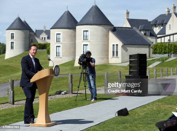 Britain's Prime Minister David Cameron, speaks to the media at a concluding press conference at the G8 venue of Lough Erne on June 18, 2013 in...