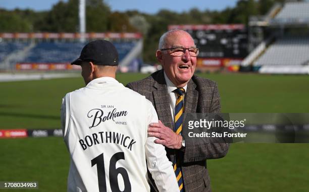 Former Durham Chairman Bob Jackson congratulates captain Scott Borthwick after winning the Second Division Title after the final day of the LV=...