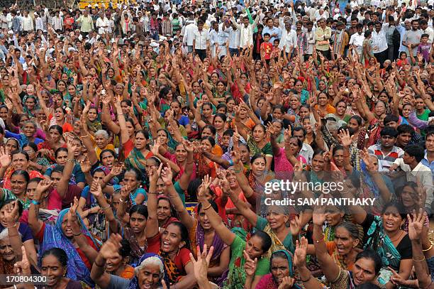 Indian farmers protest during a rally in Gandhinagar, capital of India's Gujarat state, some 30 kms. From Ahmedabad, on June 18, 2013. Nearly 5,000...