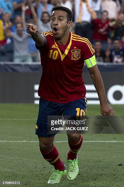 Spain's midfielder Thiago Alcantara celebrates after scoring a goal against Italy during their 2013 UEFA U-21 Championship final football match at...