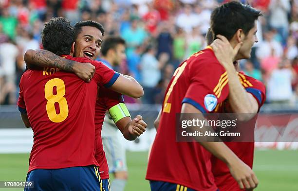 Thiago Alcantara of Spain celebrates his team's first goal with team mates during the UEFA European U21 Championship final match between Italy and...