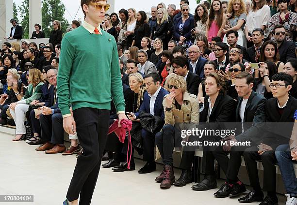 Guests including Carla Sozzani, Mohammed Al Turki, Jamie Campbell Bower, Gabriel Burce, Dan Gillespie Sells and Khalil Fong sit in the front row at...