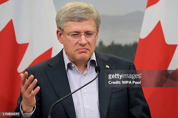 Canada's Prime Minister Stephen Harper speaks during a press conference on the second day of the G8 summit venue of Lough Erne on June 18, 2013 in...