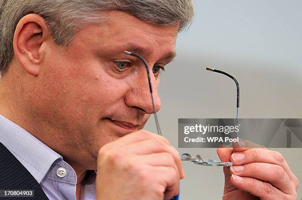 Canada's Prime Minister Stephen Harper speaks during a press conference on the second day of the G8 summit venue of Lough Erne on June 18, 2013 in...