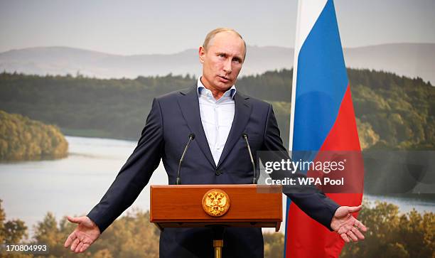 Russian President Vladimir Putin speaks during a press conference on the second day of the G8 summit venue of Lough Erne on June 18, 2013 in...