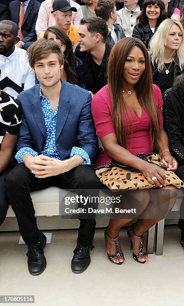 Douglas Booth and Serena Williams sit in the front row at Burberry Menswear Spring/Summer 2014 at Kensington Gardens on June 18, 2013 in London,...