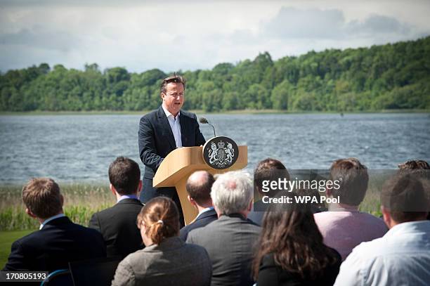 Britain's Prime Minister David Cameron, answers questions from the media at a concluding press conference at the G8 venue of Lough Erne on June 18,...