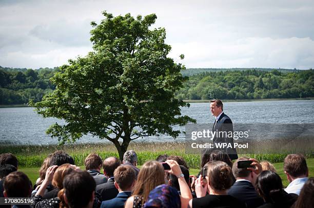 Britain's Prime Minister David Cameron, arrives for a concluding press conference at the G8 venue of Lough Erne on June 18, 2013 in Enniskillen,...