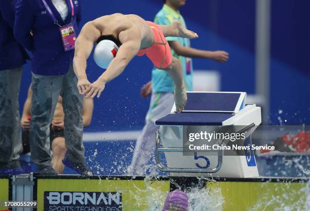 Wang Haoyu of Team China competes in the Swimming - Men's 4 x 100m Freestyle Relay Final on day five of the 19th Asian Games at Hangzhou Olympic...