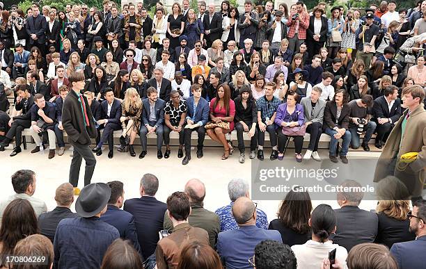 General view of the front row at Burberry Menswear Spring/Summer 2014 at Kensington Gardens on June 18, 2013 in London, England.