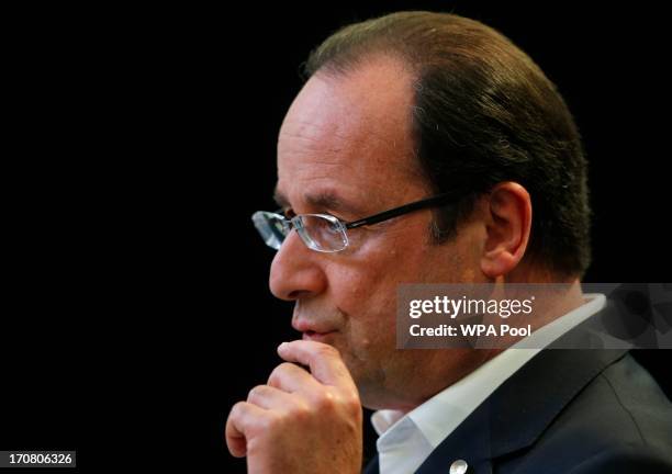 France's President Francois Hollande attends a press conference on the second day of the G8 summit venue of Lough Erne on June 18, 2013 in...