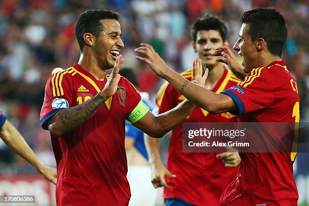 Thiago Alcantara of Spain celebrates his team's third goal with team mates Alvaro Morata and Cristian Tello during the UEFA European U21 Championship...