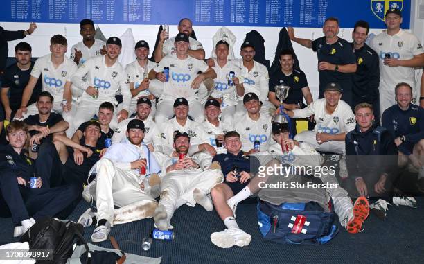 Durham players and staff celebrate the Second Division Title in the drerssing room after the final day of the LV= Insurance County Championship...
