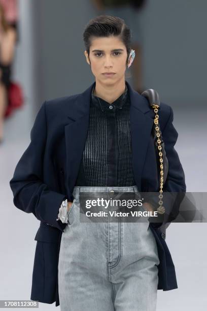 Mica Arganaraz walks the runway during the Loewe Ready to Wear Spring/Summer 2024 fashion show as part of the Paris Fashion Week on September 29,...