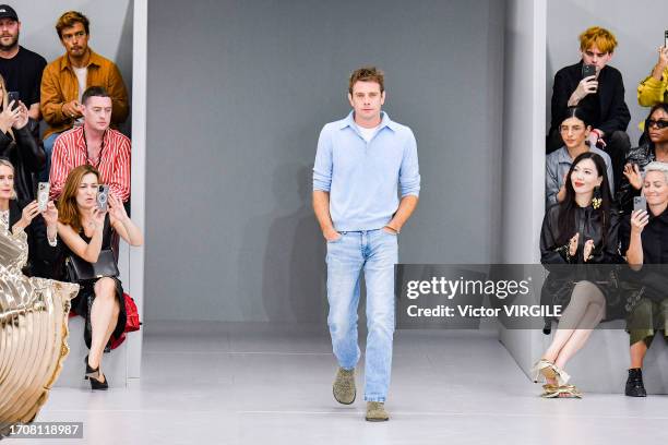Fashion designer Jonathan Anderson walks the runway during the Loewe Ready to Wear Spring/Summer 2024 fashion show as part of the Paris Fashion Week...