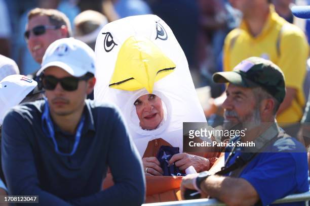 Fan of Team United States wearing an eagle costume looks on during the Friday afternoon fourball matches of the 2023 Ryder Cup at Marco Simone Golf...