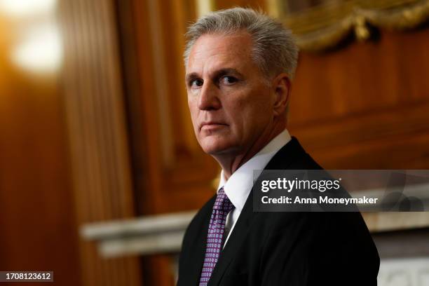 Speaker of the House Kevin McCarthy listens during a press conference on funding for the southern border at the U.S. Capitol Building on September...