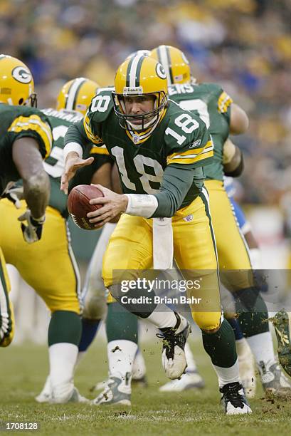 Quarterback Doug Pederson of the Green Bay Packers moves the ball during the NFL game against the Detroit Lions at Lambeau Field on November 10, 2002...